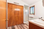 Main Level Primary Bedroom attached bathroom at Sandcastle Spirit